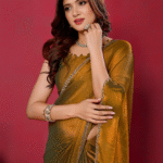 soft chiffon golden saree with a richly crafted border and an unstitched blouse piece a perfect designer party-wear choice for women soft chiffon silk fabric saree Gold color for wedding
